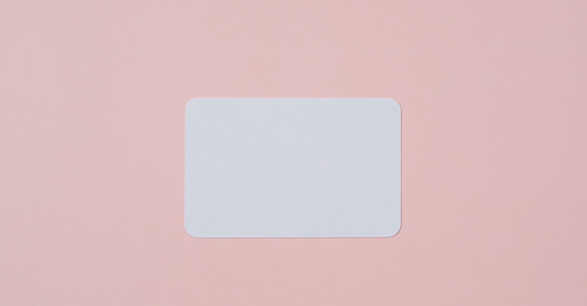 Data Tag For Dogs/Wolfs tail - White visiting card with empty space for data placed on light pink background