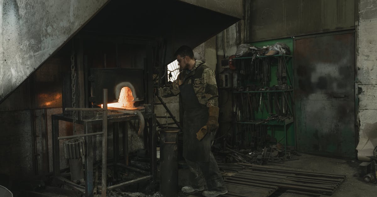 Deadlock: Items needed to upgrade furnace need upgraded furnace to be crafted - Man in Black Jacket and Brown Pants Standing in Front of Fire Deadlock: Items needed to upgrade furnace need upgraded furnace to be crafted - Man in Black Jacket and Brown Pants Standing in Front of Fire