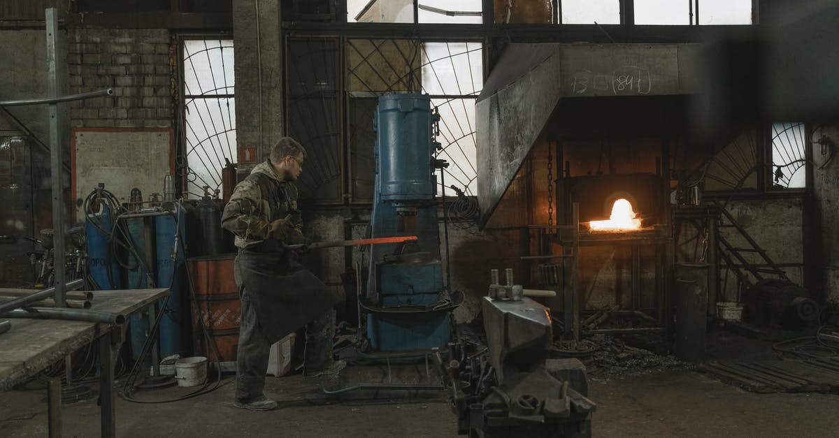 Deadlock: Items needed to upgrade furnace need upgraded furnace to be crafted - Man in Gray Jacket Standing Near Fire Deadlock: Items needed to upgrade furnace need upgraded furnace to be crafted - Man in Gray Jacket Standing Near Fire