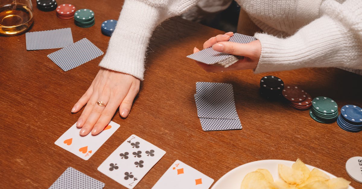 Dealing with stealth - Photo of a Person's Hands Dealing Playing Cards Dealing with stealth - Photo of a Person's Hands Dealing Playing Cards