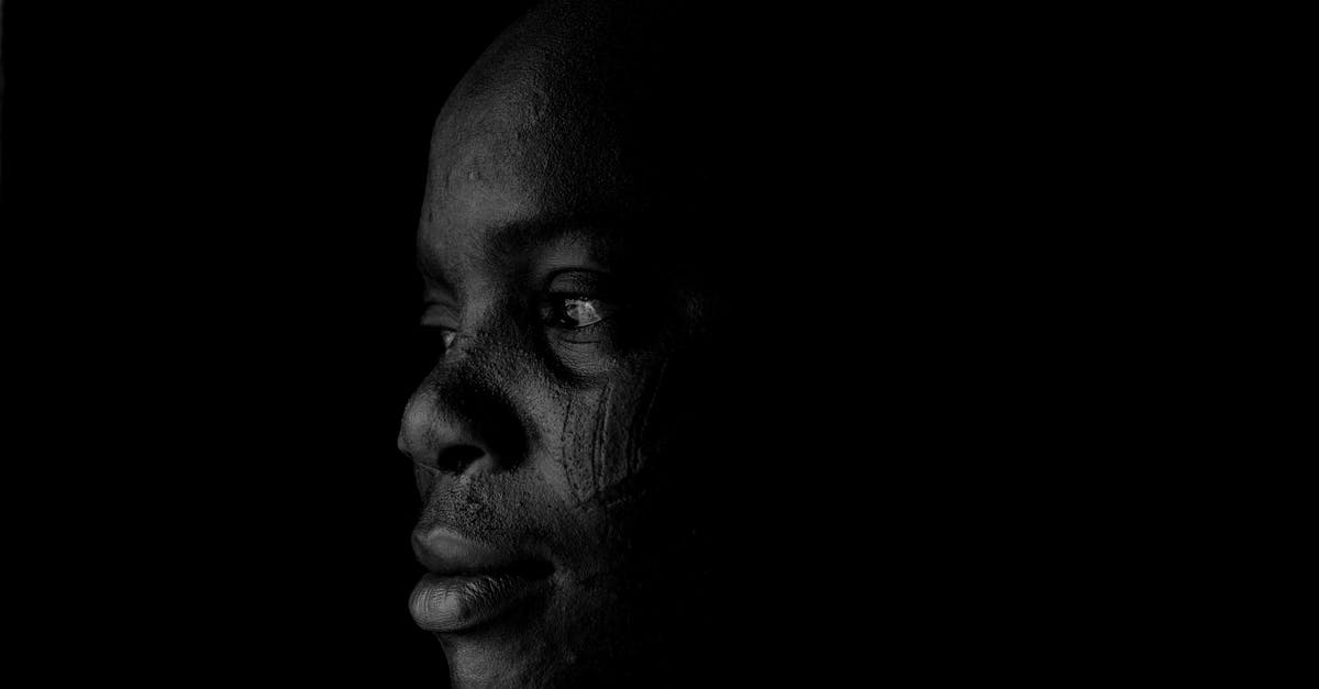 Death of Chivalry quest - Black Knight armour problem - Thoughtful black man against black background Death of Chivalry quest - Black Knight armour problem - Thoughtful black man against black background