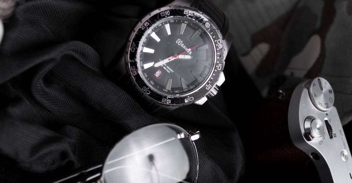 Delete blocks filled around a snowball after 5 seconds - Silver and Black Round Analog Watch