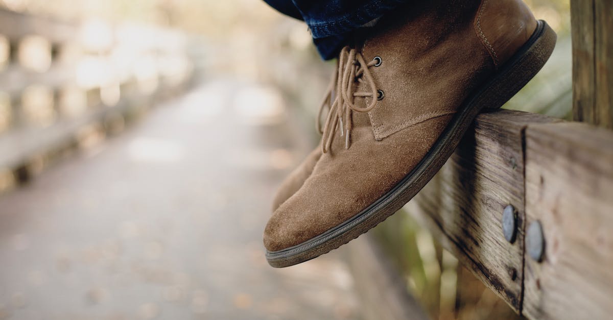 Depth Strider without boots - Close-up Photo of Person Wearing Brown Boots