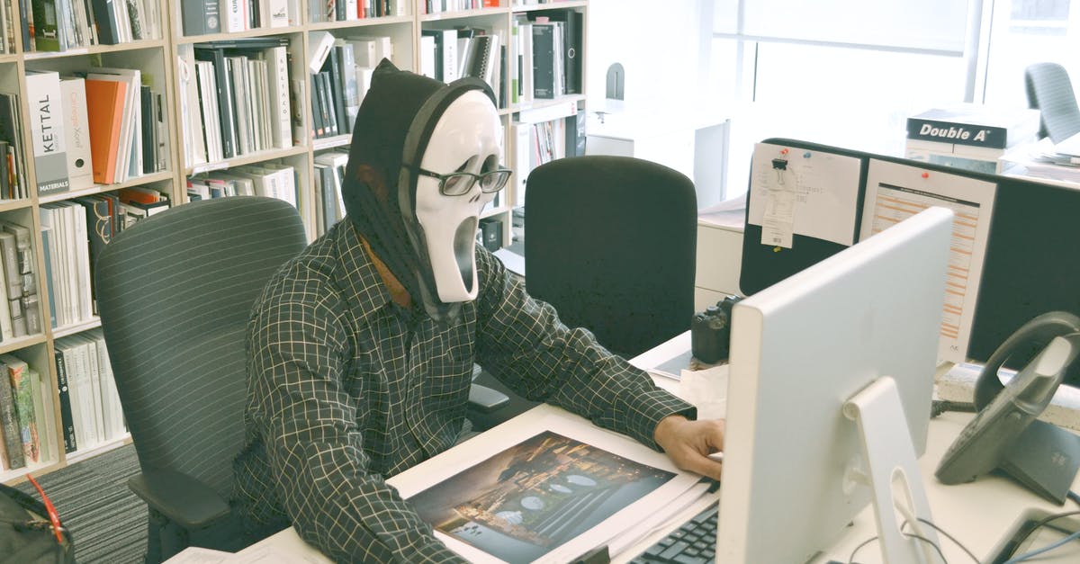 Desktop Windows Manager causes severe game lag - Person Wearing Scream Mask and Black Dress Shirt While Facing Computer Table during Daytime Desktop Windows Manager causes severe game lag - Person Wearing Scream Mask and Black Dress Shirt While Facing Computer Table during Daytime