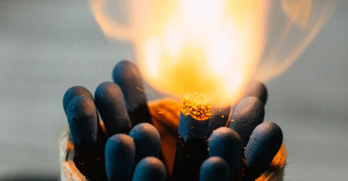 Detect if player clicks with item such as stick or blaze rod? - Closeup of burning fire on match head among pile of black matches in jar on blurred background Detect if player clicks with item such as stick or blaze rod? - Closeup of burning fire on match head among pile of black matches in jar on blurred background