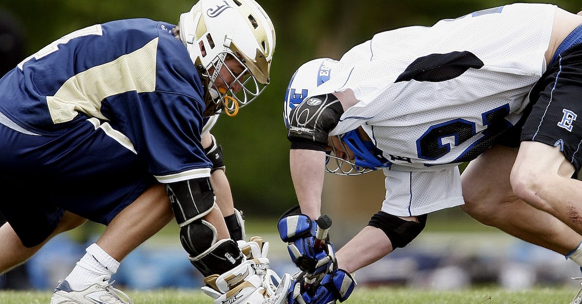 Detect if player clicks with item such as stick or blaze rod? - Selective Focus Photography of Two Men Playing American Football Detect if player clicks with item such as stick or blaze rod? - Selective Focus Photography of Two Men Playing American Football