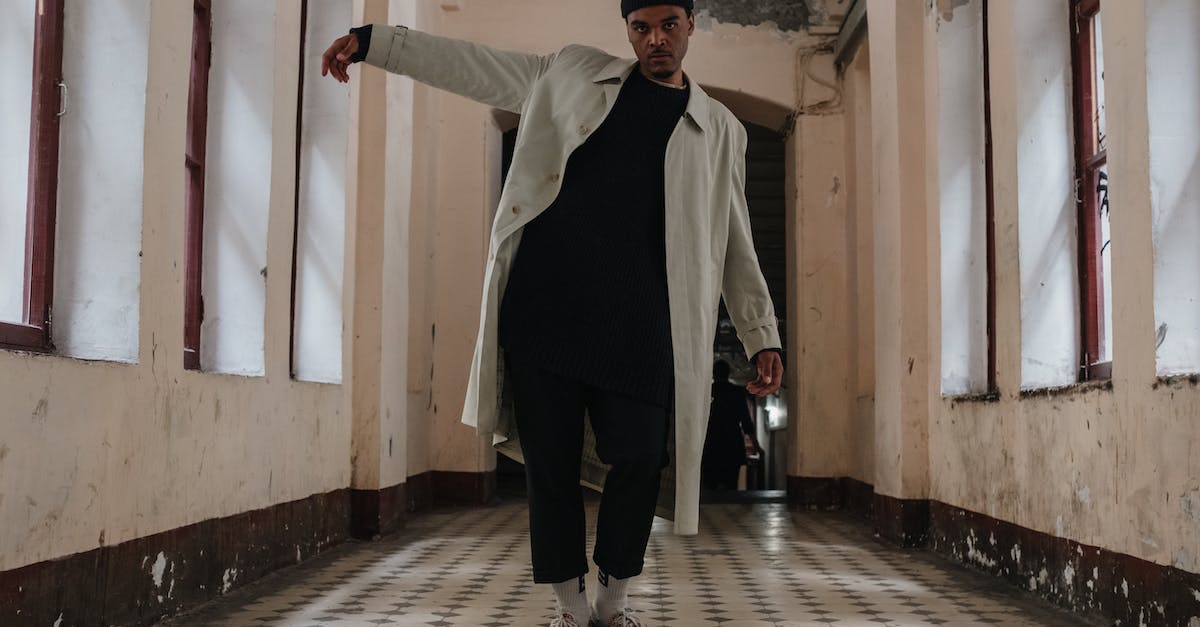 Diablo 3 RoS Damage model - Man in Black Jacket and Black Pants Standing on Brown Wooden Floor