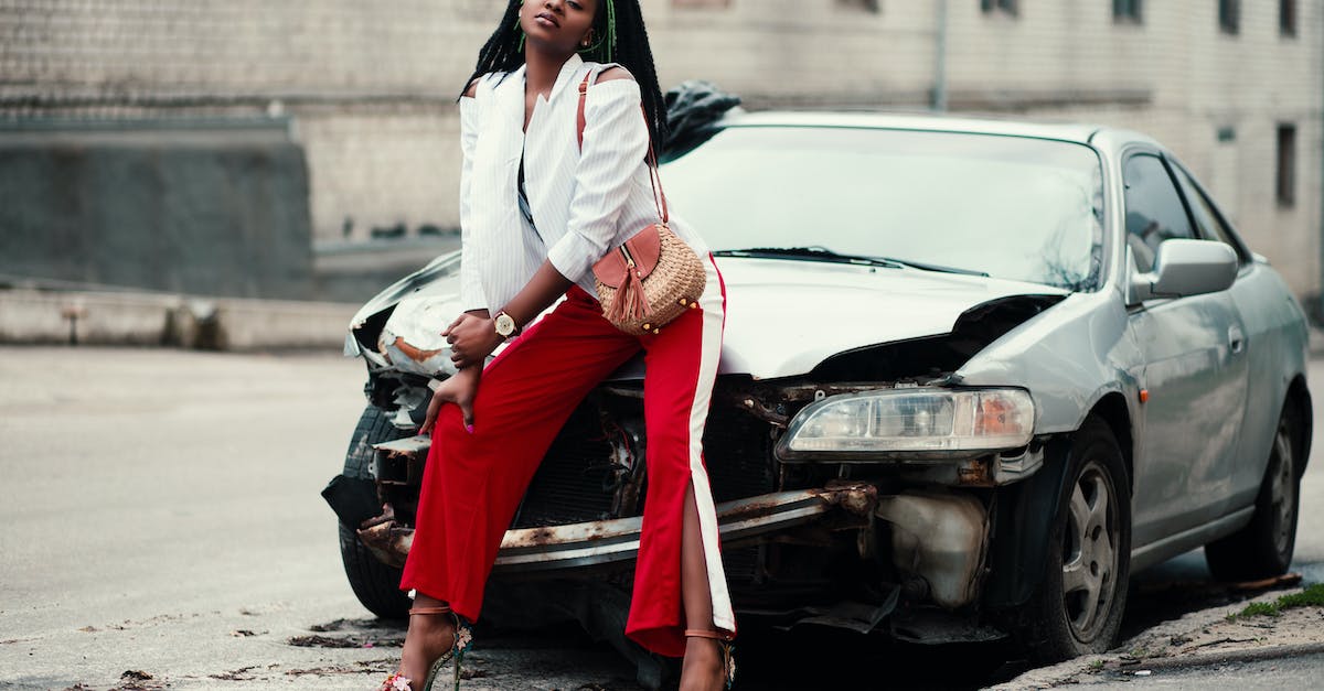 Diablo 3 RoS Damage model - Woman in White Open Cardigan and Red and White Pants Sitting on Damage White Car Diablo 3 RoS Damage model - Woman in White Open Cardigan and Red and White Pants Sitting on Damage White Car