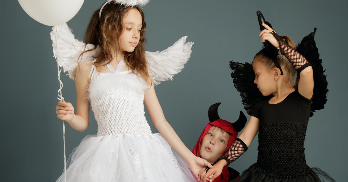 Diablo angel and demon name etymologies - Three Children in Halloween Costumes