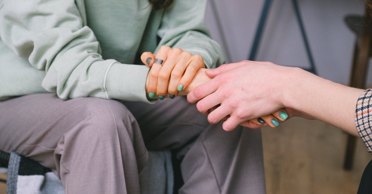 Dialogue help please! - Crop psychologist supporting patient during counseling indoors Dialogue help please! - Crop psychologist supporting patient during counseling indoors