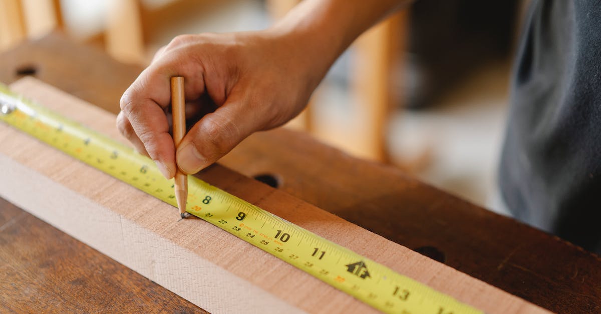 Did DICE ever fix the Battlefield 4 texture flickering? - Man working with measurement yellow tape on wooden plank Did DICE ever fix the Battlefield 4 texture flickering? - Man working with measurement yellow tape on wooden plank