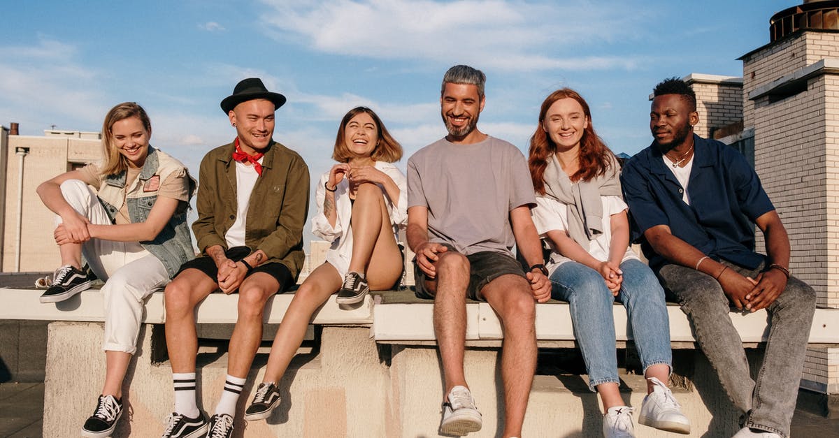 Did my Uplifted citizens suddenly wipe out the entire population of the planet? - Group of People Sitting on Concrete Bench