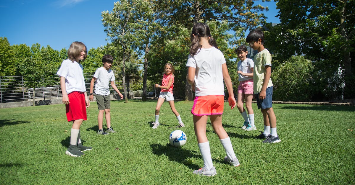 Did playing Hearthstone during the beta grant any benefits that can't be matched by playing the game later? - A Group of Kids Playing Football at the Field