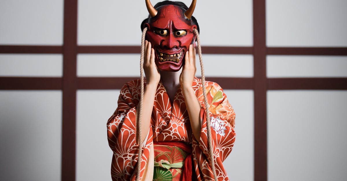 Did the owl statues really not exist at all in the Japanese versions of The Legend of Zelda: Majora's Mask? - A Person in a Kimono Wearing a Hannya Mask