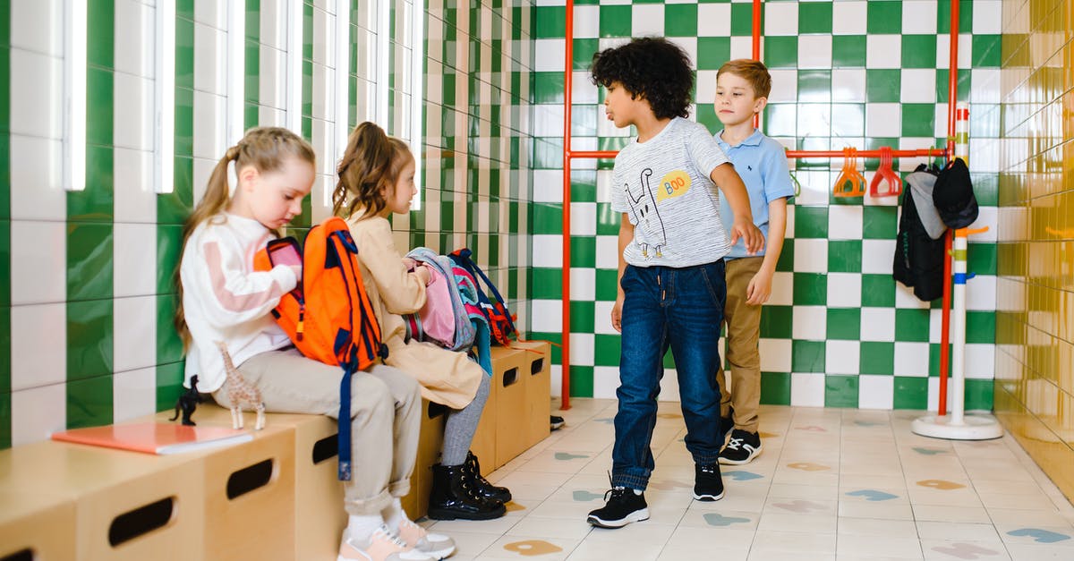 Difference between backpacks with same ability - 2 Boys and Girl Standing on White Floor Tiles Difference between backpacks with same ability - 2 Boys and Girl Standing on White Floor Tiles