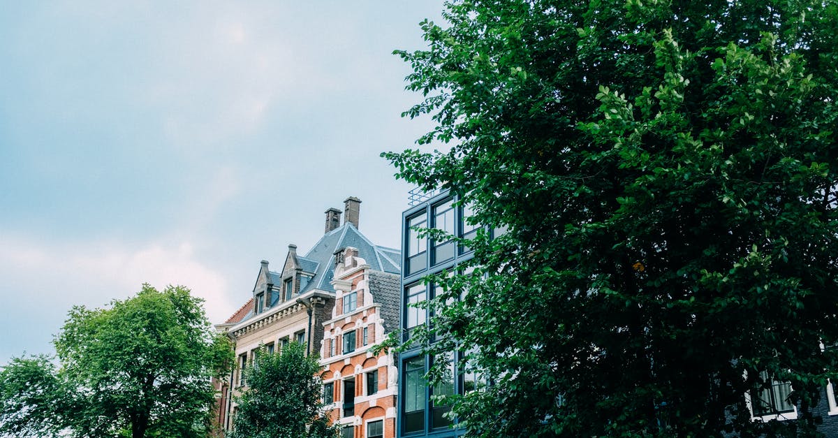 Difference between old Nearby and new Sightings? [duplicate] - Exteriors of various residential buildings against cloudy sky