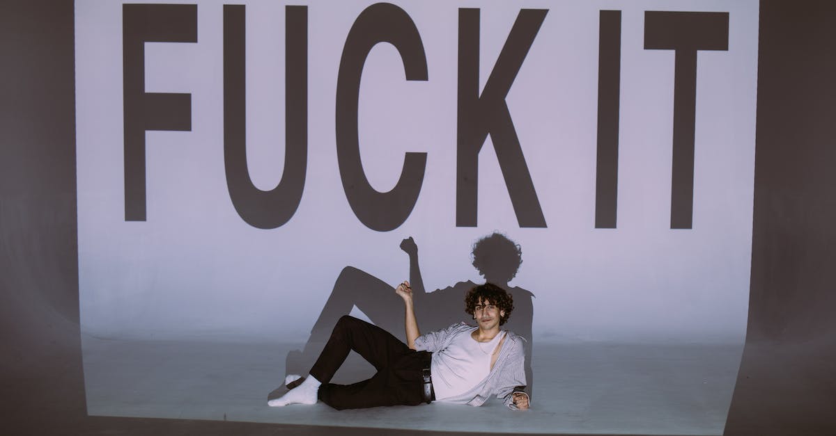 Disable powersuit text (or move it) - Man Sitting on Floor With His Shadow On Wall