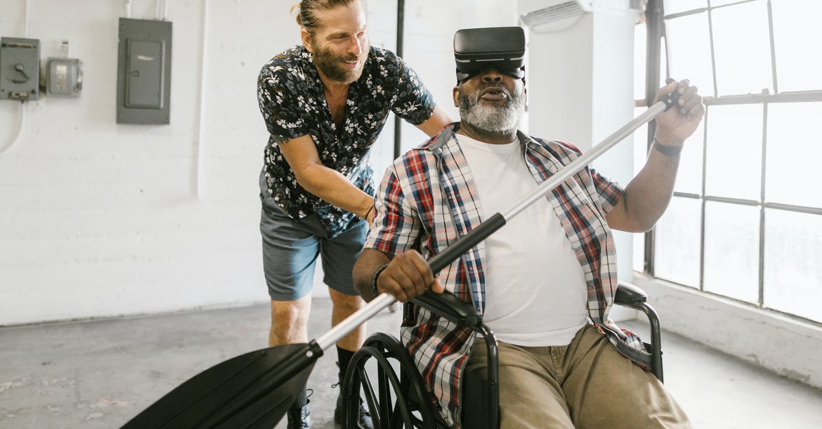 Disabling enemy AI - Man Helping a Man Play with Virtual Reality Headset