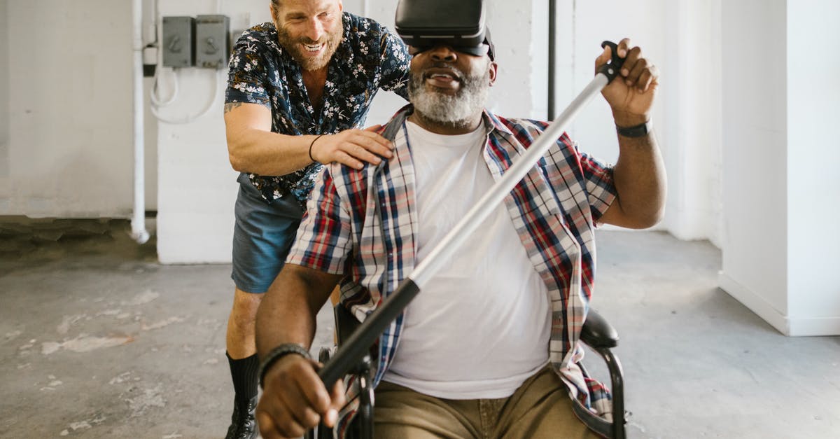 Disabling enemy AI - Man paddling while wearing Virtual Reality Glasses Disabling enemy AI - Man paddling while wearing Virtual Reality Glasses