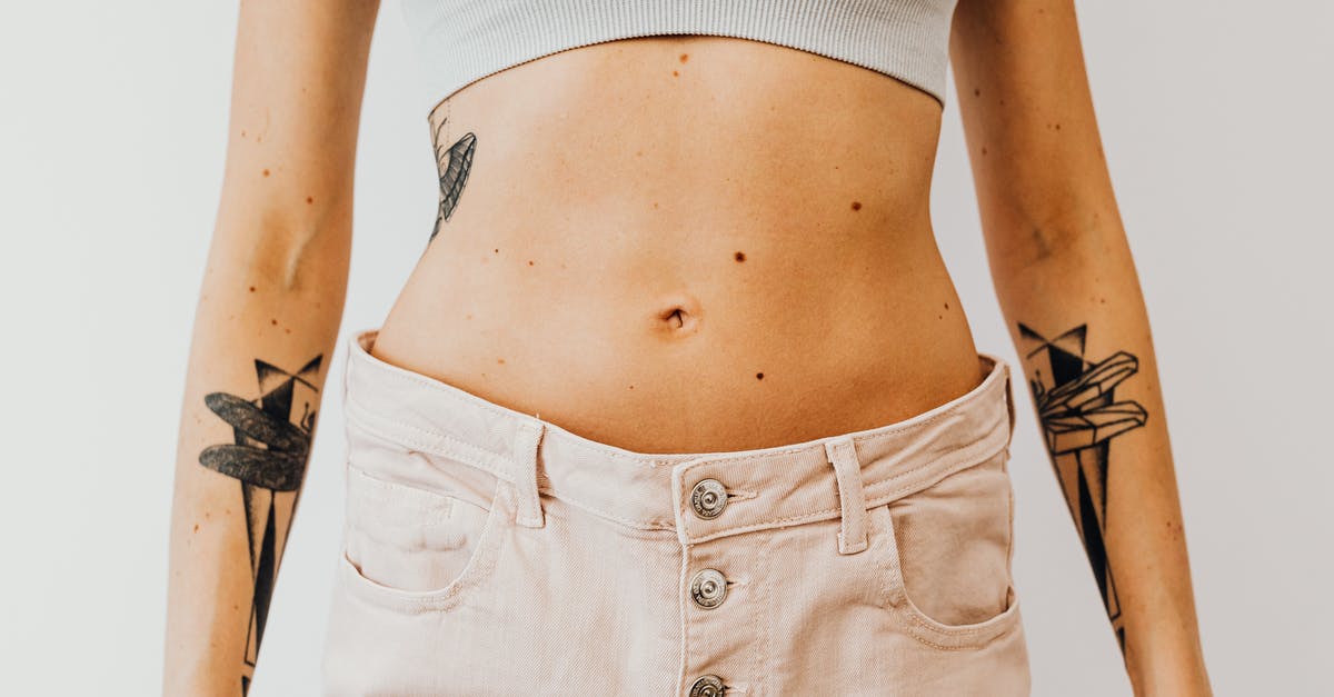 Disappearing Butler in The Sexy Brutale - Woman in White Crop Top and Blue Denim Shorts Disappearing Butler in The Sexy Brutale - Woman in White Crop Top and Blue Denim Shorts