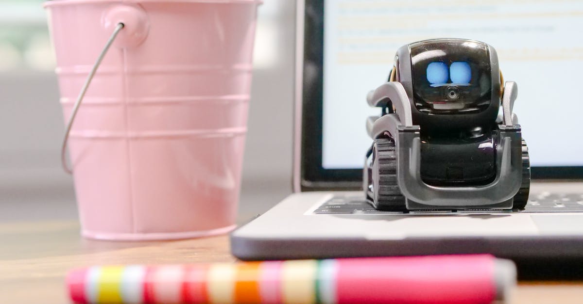 Discord bot node.js currency system guide bot error [closed] - MIniature Toy Robot on Top of Laptop's Keyboard