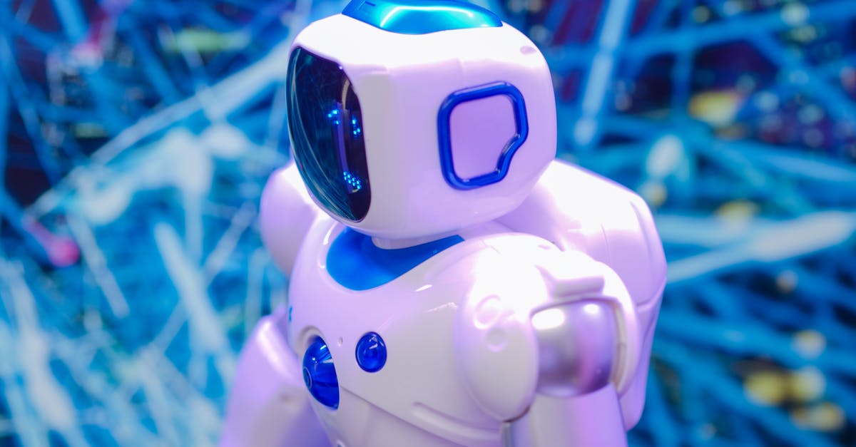 Discord bot node.js currency system guide bot error [closed] - HIgh Angle Shot of Toy Robot