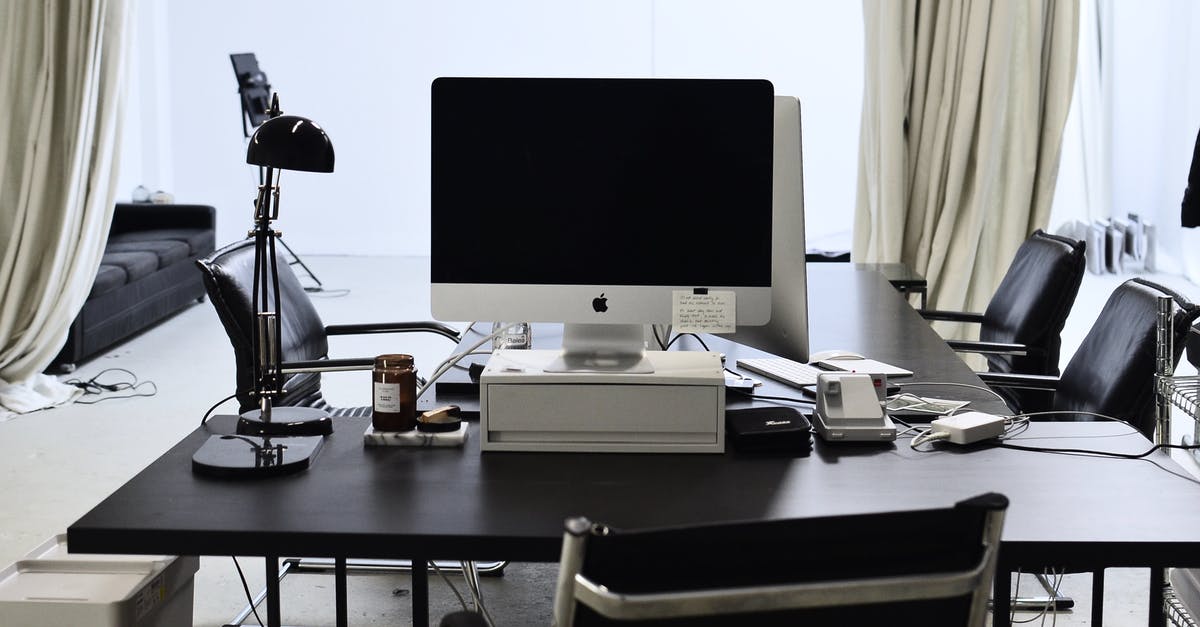 Display armor as an item in head slot - Interior of convenient workspace with contemporary computer placed on table with lamp in modern light office with couch against window