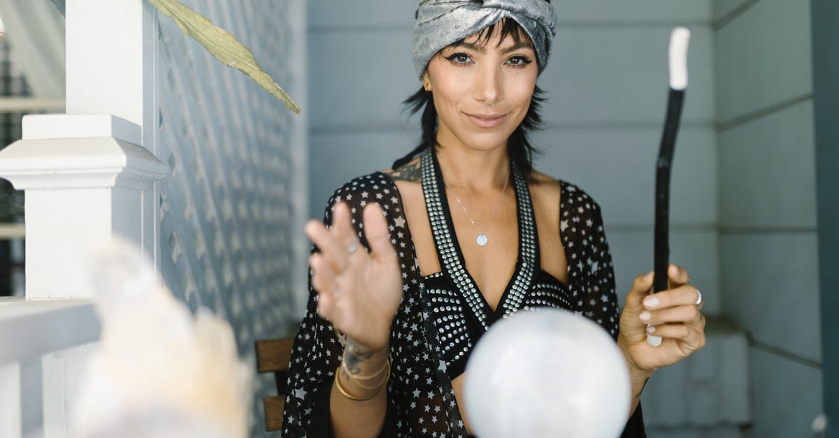 Divinity Original Sin EE - What is the gameplay of a Dual Wielding Grenade Wizard Build? - Woman in Gray Headband Standing Near the Crystal Ball while Smiling at the Camera