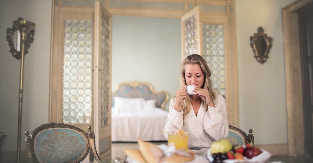 Do 200cc and mirror cup stars/trophies stack? - Glad female in elegant wear sitting at table with metal tray of healthy breakfast in vintage hotel room and drinking coffee in morning Do 200cc and mirror cup stars/trophies stack? - Glad female in elegant wear sitting at table with metal tray of healthy breakfast in vintage hotel room and drinking coffee in morning
