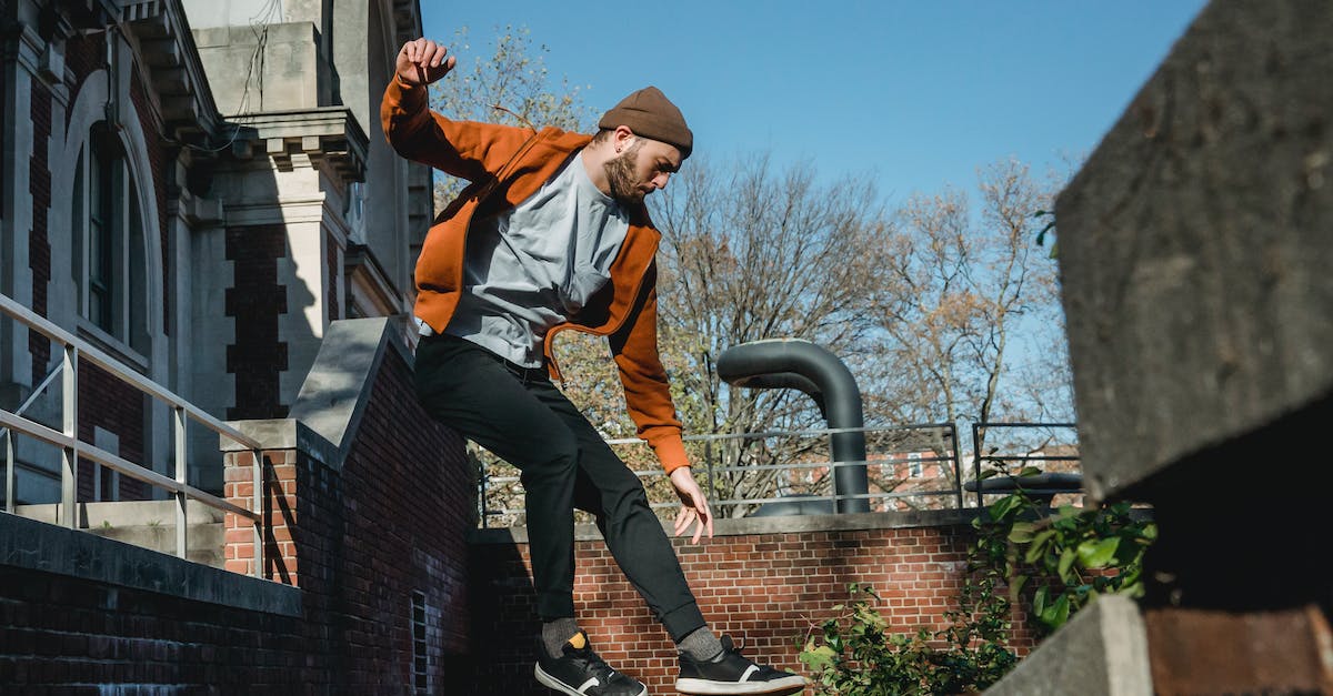 Do Adrenaline Skills have separate adrenaline bars? - Sporty man jumping from brick building railing