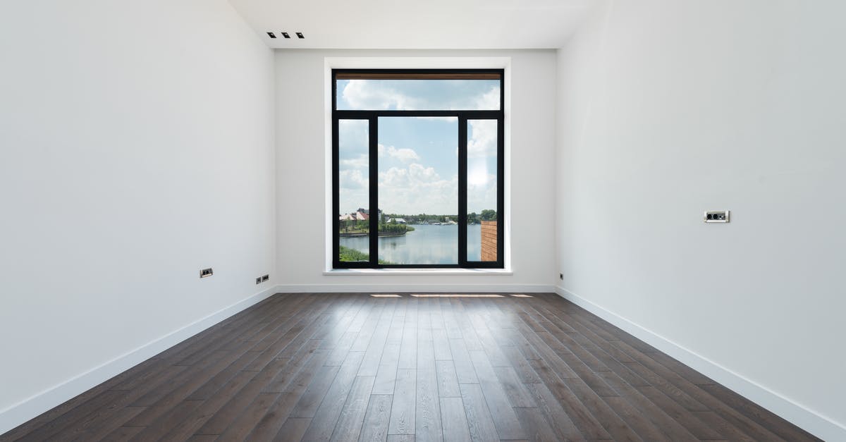 Do all ships have the same amount of space inside them? - Interior of modern spacious light room with wooden laminate floor white walls and panoramic windows Do all ships have the same amount of space inside them? - Interior of modern spacious light room with wooden laminate floor white walls and panoramic windows