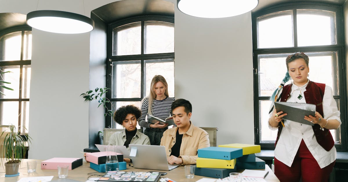 Do any other Origin games ignore reconfiguring WIndows to put the Documents folder elsewhere? - Busy Employees Working Together in the Office Do any other Origin games ignore reconfiguring WIndows to put the Documents folder elsewhere? - Busy Employees Working Together in the Office