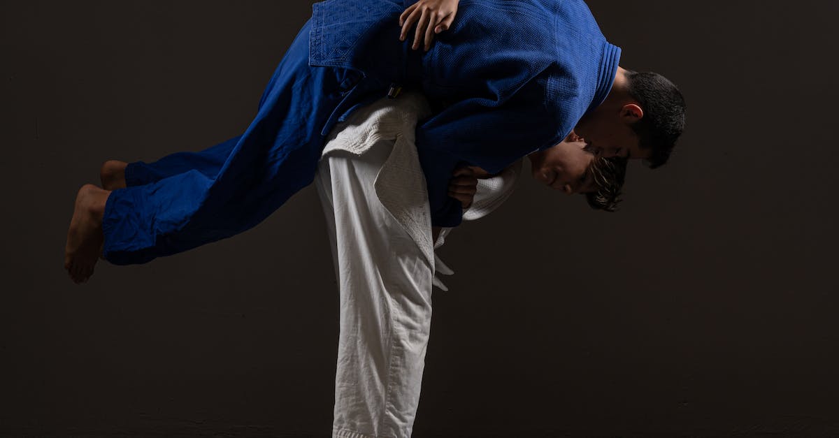 Do attack speed debuffs affect champions with auto-attack resets and auto-attack cancel spells? - Side view of young barefooted Asian male judokas in uniform fighting on floor against black background Do attack speed debuffs affect champions with auto-attack resets and auto-attack cancel spells? - Side view of young barefooted Asian male judokas in uniform fighting on floor against black background