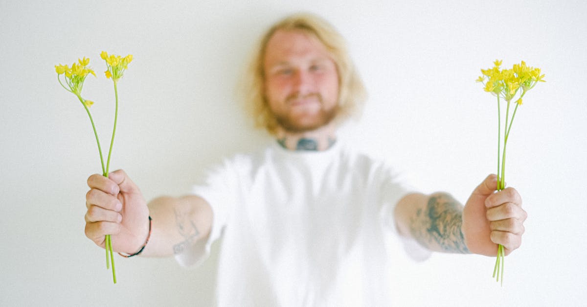 Do beacons give buffs to friendly mobs? - Smiling unshaven man with colorful blossoming flowers