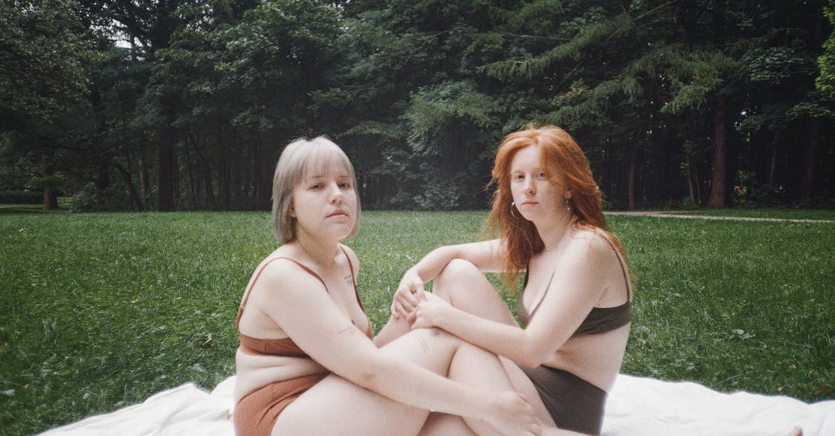 Do bodies disappear in Doom? - Women Sitting on a White Linen on the Park