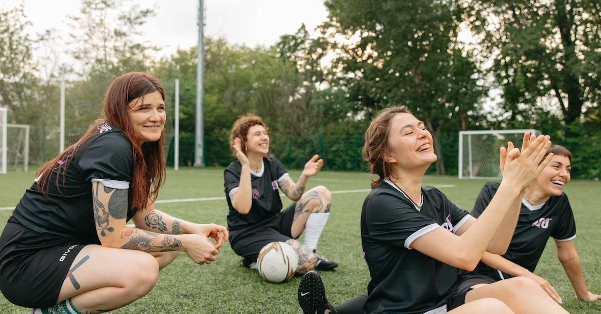 Do Distant Worlds AI Players Have The Same Restrictions As The Human Player? - 2 Women in Black and White Shirts Playing Soccer on Green Grass Field