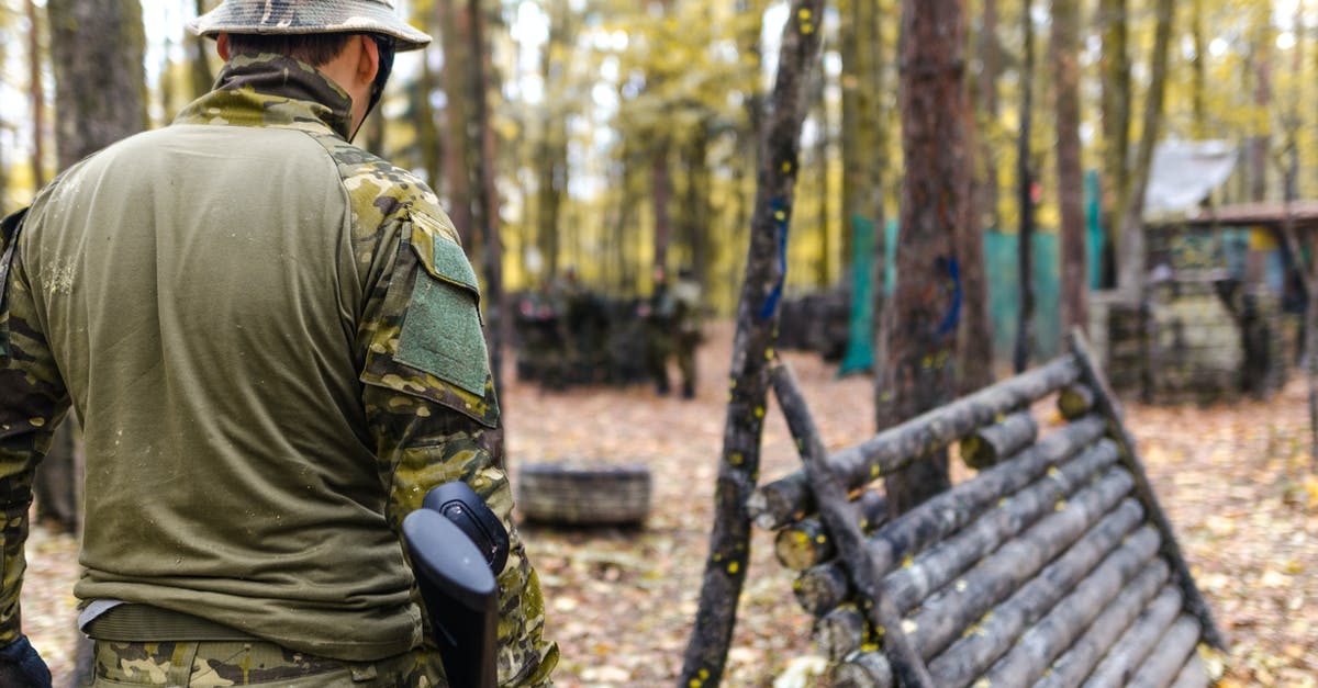 Do equipment and weapons have tiers? - Selective Focus Photography of Man Wearing Camoflouge Suit While Holding a Gun