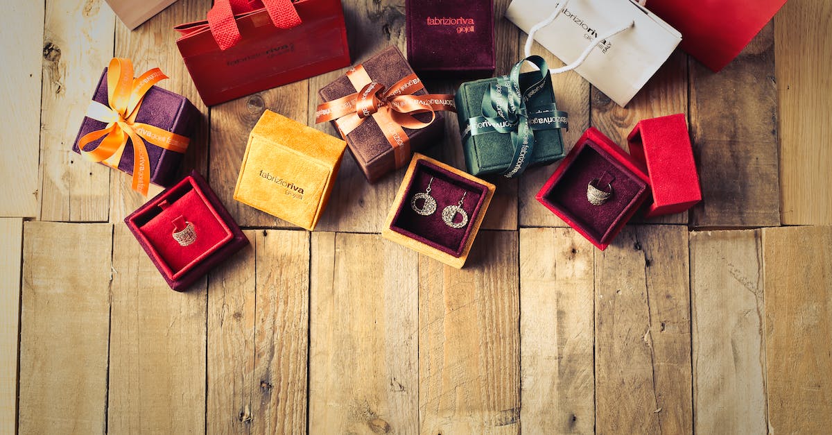 Do gold weapons and the Ring of Gold stack? - Assorted Gift Boxes on Brown Wooden Floor Surface Do gold weapons and the Ring of Gold stack? - Assorted Gift Boxes on Brown Wooden Floor Surface