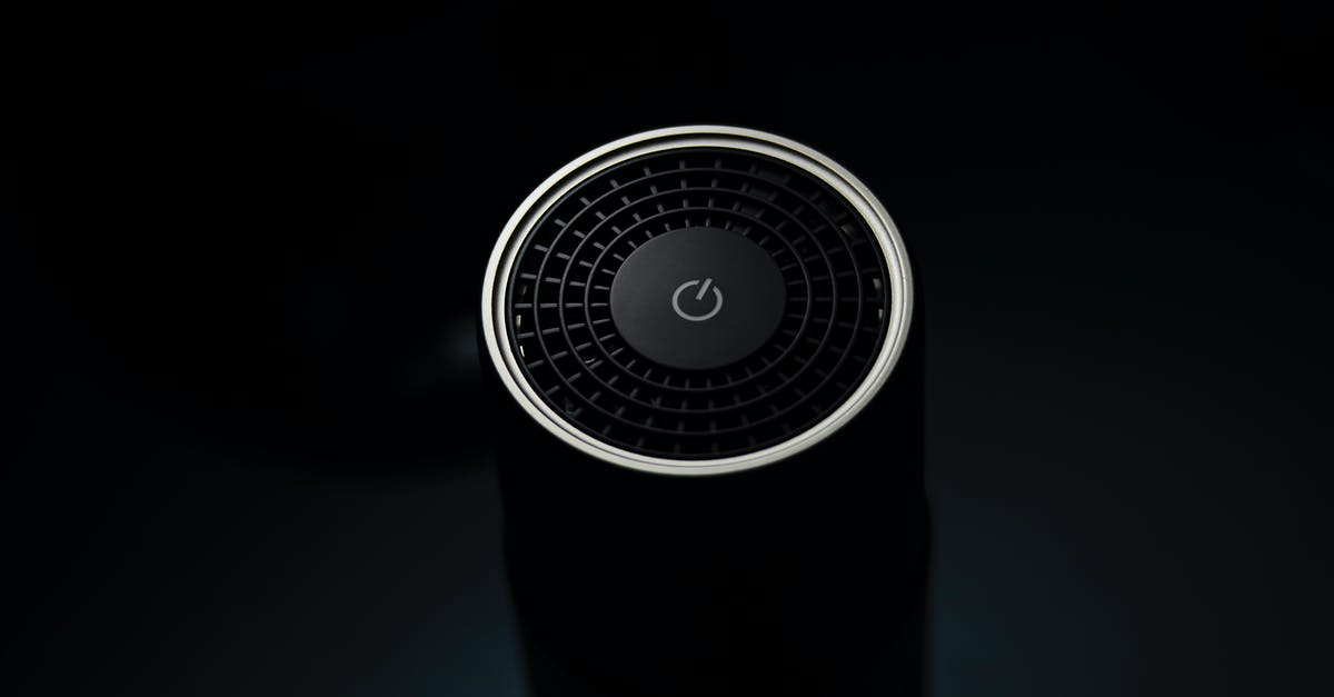 Do I always need to start at the begining when switching phones? [duplicate] - High angle of round wireless smart speaker with power button placed on table