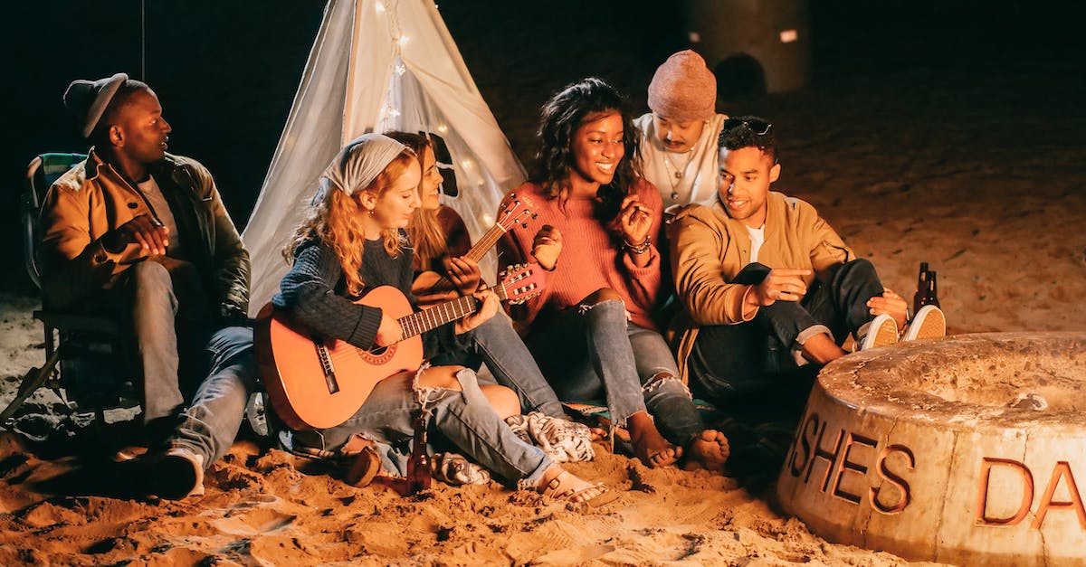 Do I have to have friends to sell my things? - Group of Friends Sitting on Beach Sand