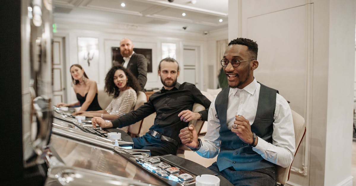 Do I have to lose to win? - People Looking at the Man Winning at the Slot Machine Do I have to lose to win? - People Looking at the Man Winning at the Slot Machine