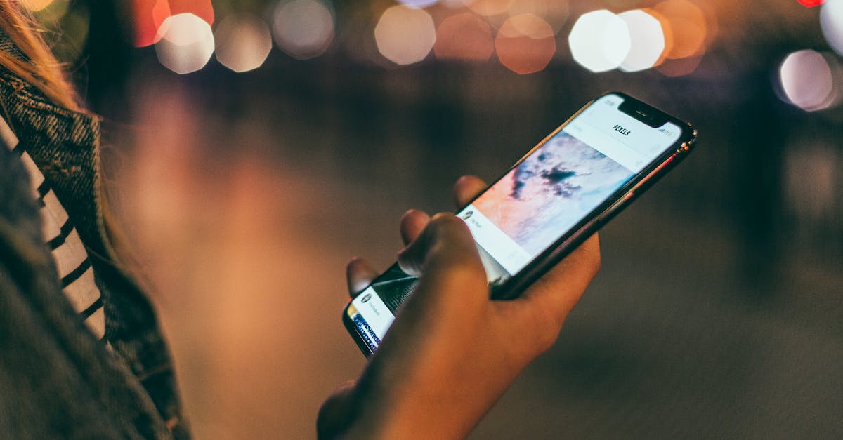 Do I have to make light sources in Dwarf Fortress? [closed] - Person Holding Space Gray Iphone X