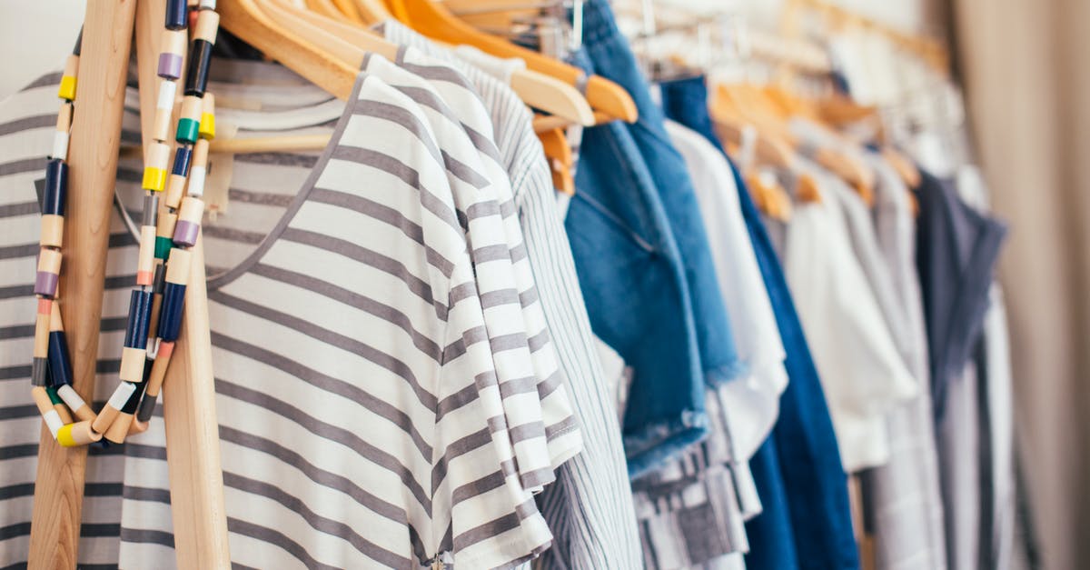 Do I have to select new quirks? - Wooden hangers with different clothes in wardrobe Do I have to select new quirks? - Wooden hangers with different clothes in wardrobe