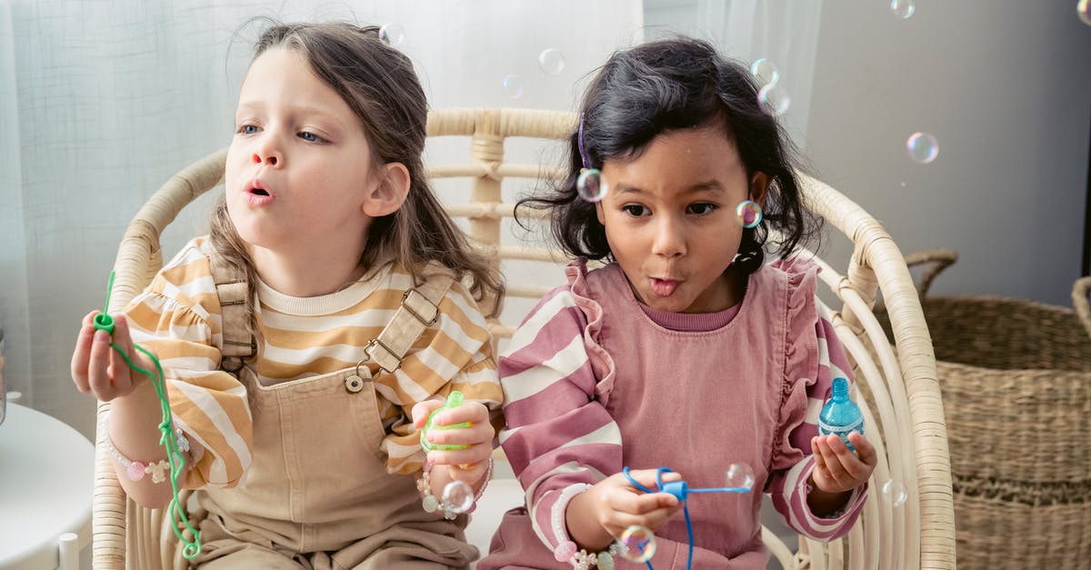 Do I have to stick to a class throughout an entire MvM campaign? - Carefree multiracial girls blowing soap bubbles in armchair at home Do I have to stick to a class throughout an entire MvM campaign? - Carefree multiracial girls blowing soap bubbles in armchair at home