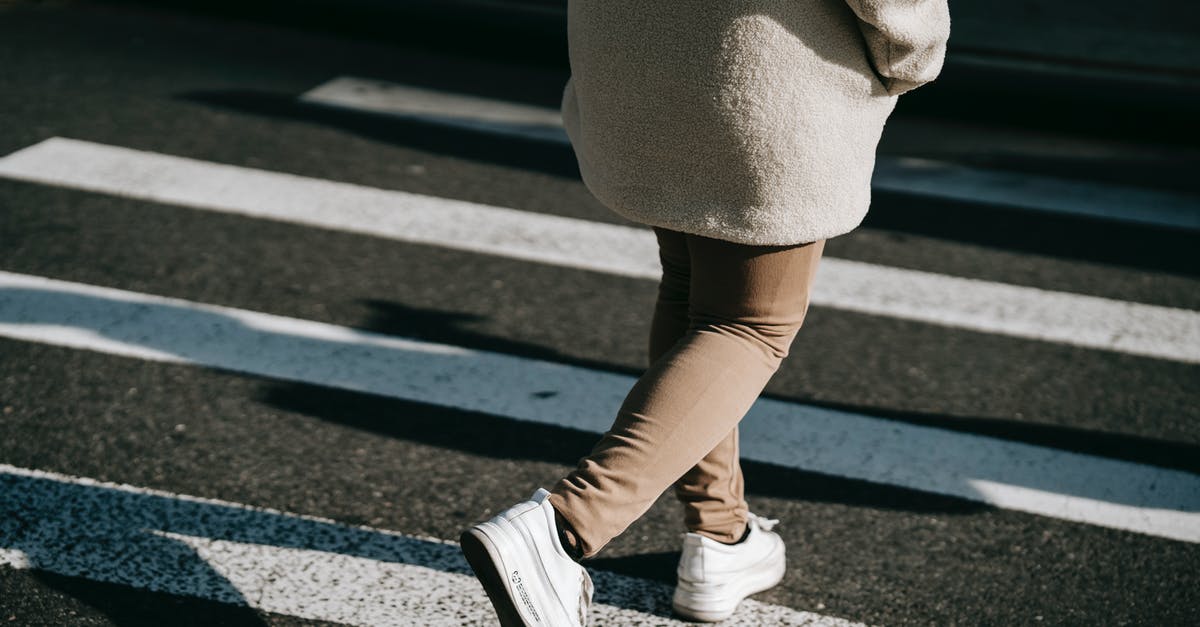 Do I keep the season pass? if uninstalled? - Crop faceless woman walking on zebra