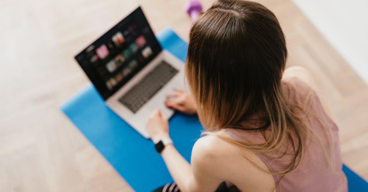 Do I need internet connection to install Spiderman for PS4 from physical copy? - Woman sitting on mat and surfing internet on laptop Do I need internet connection to install Spiderman for PS4 from physical copy? - Woman sitting on mat and surfing internet on laptop
