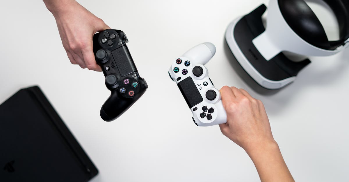 Do I need Playstation Plus to play Splitscreen? - Person Holding White and Black Xbox One Game Controller