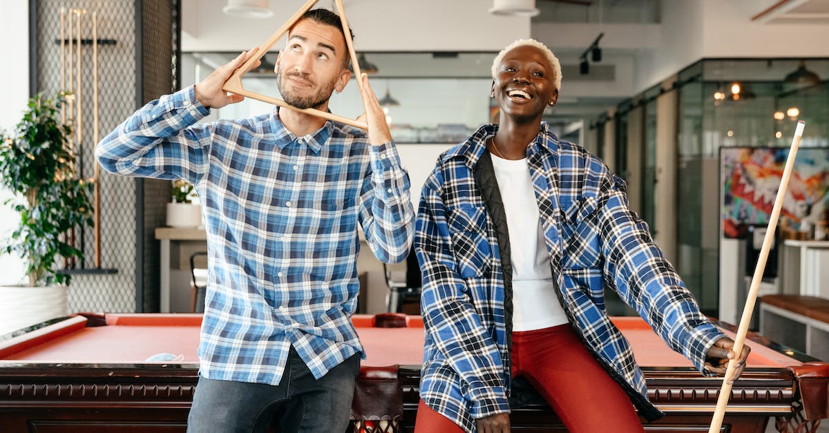 Do I need the .cue file to play ps1 games on epsxe - Cheerful diverse friends sitting on billiard table and having fun together