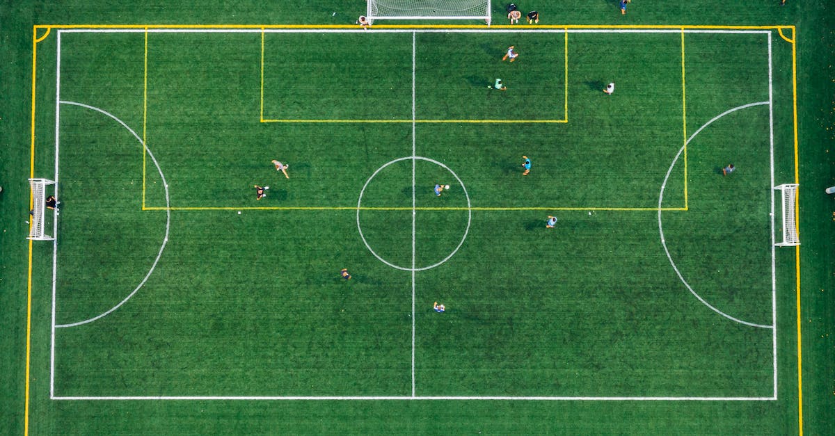 Do I need to begin from the first game for the story of Assassin's Creed? - Aerial Photography Of People Playing Soccer