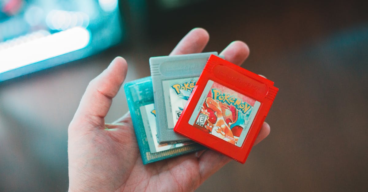 Do I need to open a Pokemon game to add the Pokemon to my Pokedex? - Person Holding Video Games Do I need to open a Pokemon game to add the Pokemon to my Pokedex? - Person Holding Video Games